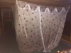 Our mosquito net around the bed at night