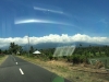 In the car; Rinjani clouded over; looks cold and damp
