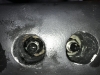 Two of the three rudder bolt holes.....nothing was used to protect the nuts from seawater
