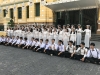 Theses were students posing for their graduation picture at the Post Office