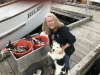 Kathy getting doggie luv from our fisherman neighbors