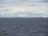 Snow covered mountains on Chihcagof Island where we are going!!