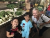 Kathy with some children at the market......"halo Auntie"