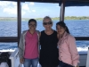 Kathy on the dive boat with 2 of the restaurant servers