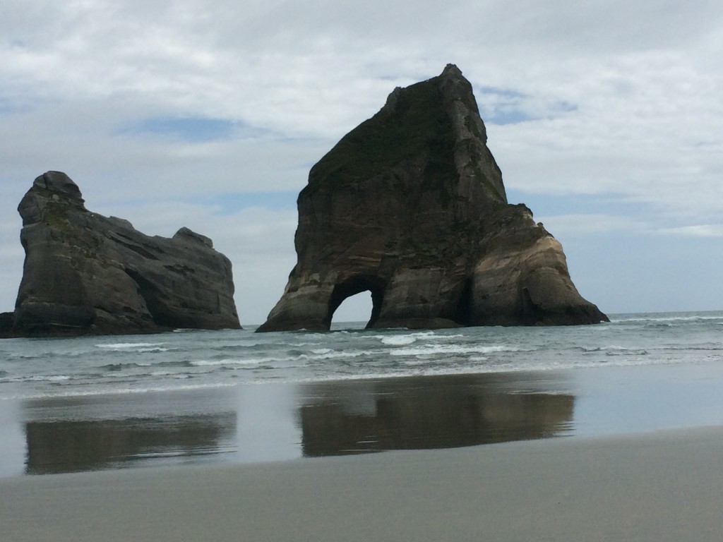 Icon New Zealand arch  at Wharaki Beach