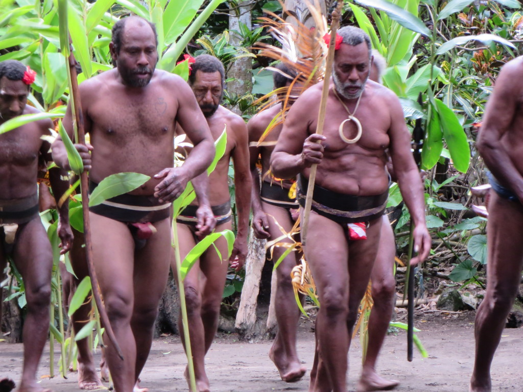 Chief on the right; notice the pig tusk and Namba (penis sheath)