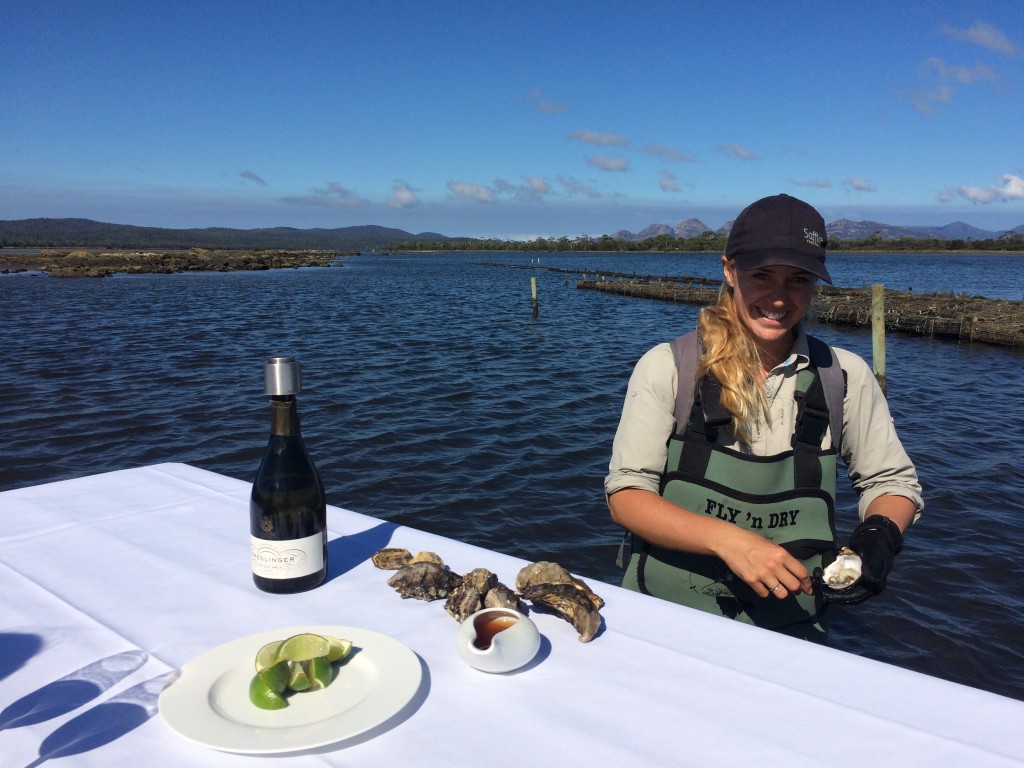 Emma shucking our oysters